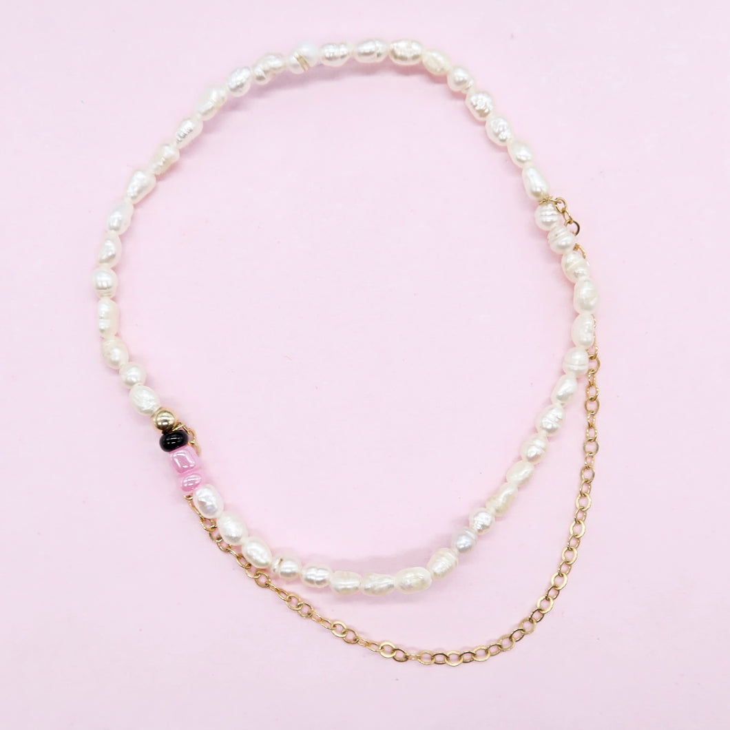 Petite pearl bracelet with gold chain layer